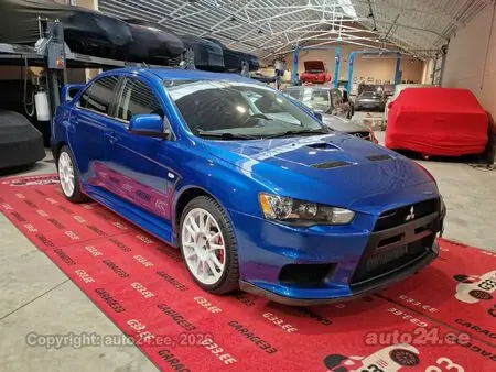 2012 — MITSUBISHI LANCER EVOLUTION — 33,405 km