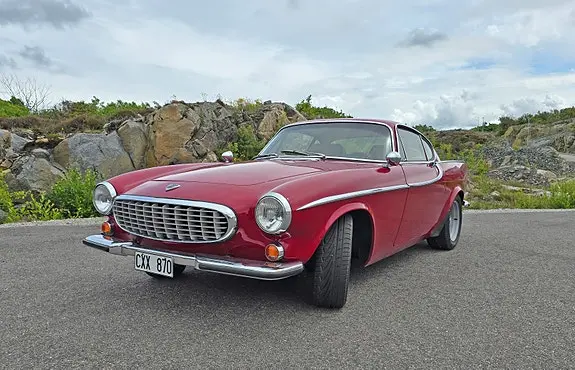 Volvo P1800 S — 100 km